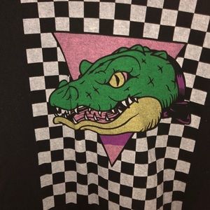 A black tee wit a crocodile on it and checkered!!!